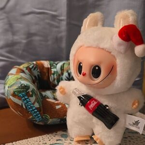 Handmade sofa for labubu dolls. Slough print fabric.